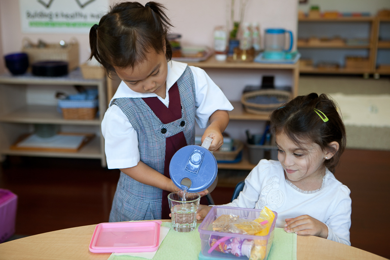 Children learning in a Montessori classroom at Casa dei Bambini